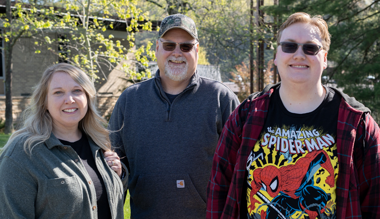 Family smiling during Open House
