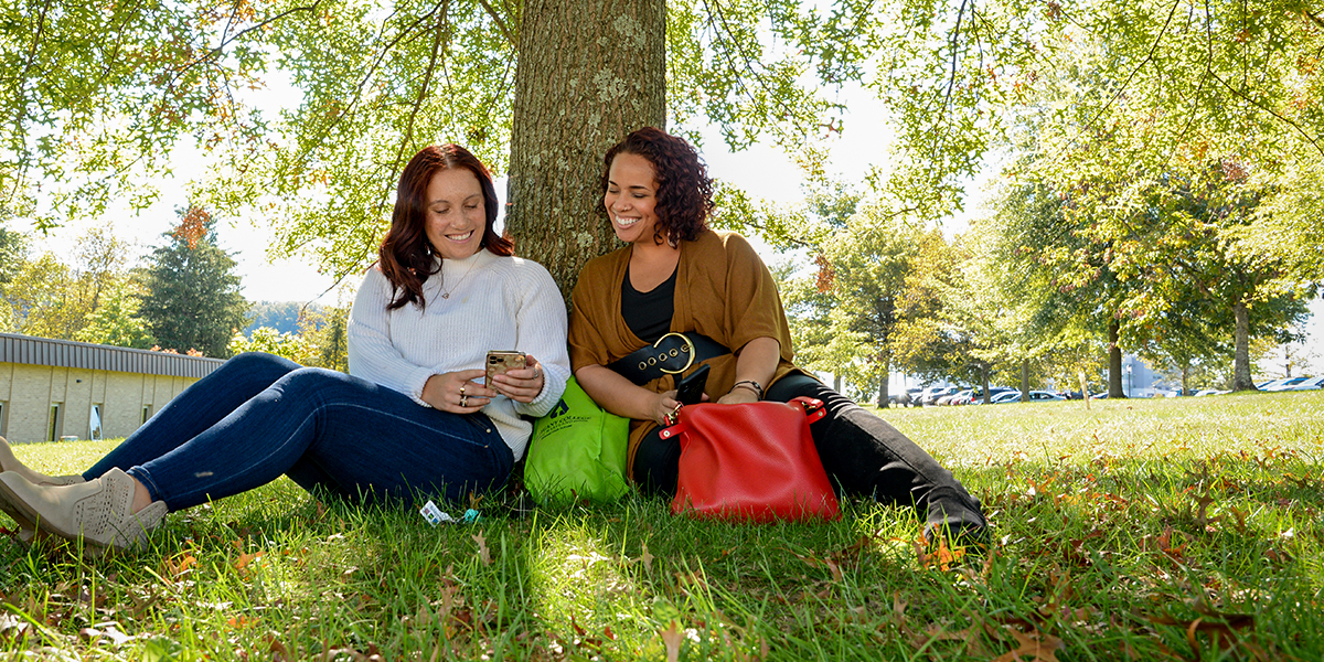 students looking at phone