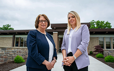 President Cynthia Bambara and Debra Swope