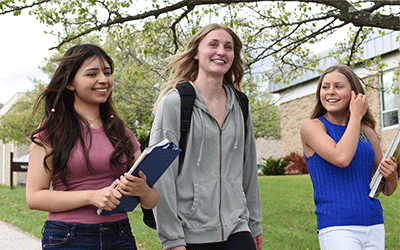 3 students walking on Cumberland campus