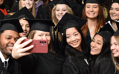 Group of ACM grads at a prior graduation ceremony
