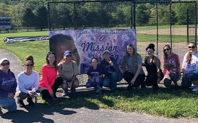 RT students, walkers with Mission for Mya banner