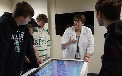 Dr. Brunelli and students using Anatomage