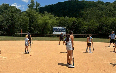 2023 softball campers at group practice