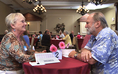 Individuals at speed dating event, The Age of Love film 