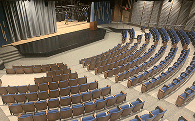 Workers finish up Zimmer Theatre, install curtains