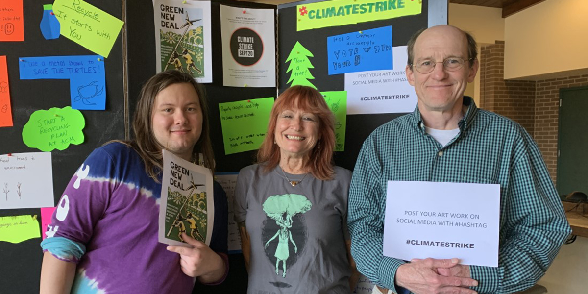 Sociology Student with Climate Strike Poster